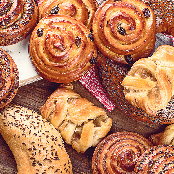 square_baked Baked goods piled on a wooden background